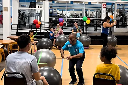 ymca staff teaching a class to youth